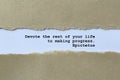 devote the rest of your life to making progress epictetus on white paper Royalty Free Stock Photo