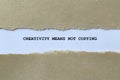 creativity means not copying on white paper Royalty Free Stock Photo