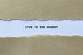 live in the moment on white paper Royalty Free Stock Photo