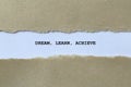 dream learn achieve on white paper Royalty Free Stock Photo
