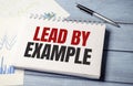 lead by example text on card, concept background Royalty Free Stock Photo