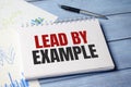 lead by example text on card, concept background Royalty Free Stock Photo