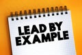 Lead By Example text on notepad, concept background Royalty Free Stock Photo