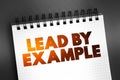 Lead By Example text on notepad, concept background Royalty Free Stock Photo