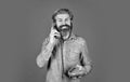 Lead generation specialist. Sales script. Bearded man phone conversation. Retro phone. Outdated technology. Manager