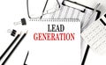 LEAD GENERATION word on notepad with clipboard , chart and calculator, business concept
