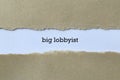 Big lobbyist on white paper Royalty Free Stock Photo