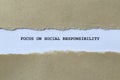 focus on social responsibility on white paper Royalty Free Stock Photo