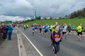 Lead Runners and Onlookers at the first Stirling Marathon Scotlans.