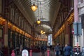 Leadenhall market decorated with British flags and lots of business people having a lunch.