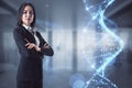 Leader genes for success in business concept with confident businesswoman and virtual spiral dna icon Royalty Free Stock Photo