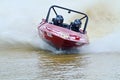 Leader racing speedboat competing at powerful speed