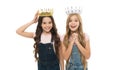 Leadership concept. Girls wear crowns. Spoiled children concept. Egocentric princess. Kids wear golden crowns symbol Royalty Free Stock Photo