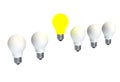 Leadership concept with illuminated light bulb leading among white