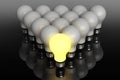 Leadership concept. One glowing light bulb standing in front of Royalty Free Stock Photo