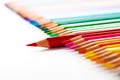 leadership concept with one pencil standing out of crowd of other pencils Royalty Free Stock Photo