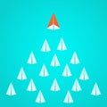 Leadership concept. Orange paper airplane leader standing out from the crowd. Business advantage opportunities and success concept