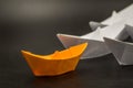 Leadership concept. paper ships follow the leader