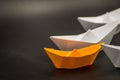 Leadership concept. paper ships follow the leader Royalty Free Stock Photo