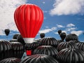 Leadership concept with red hot air balloon Royalty Free Stock Photo