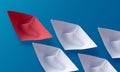 Leadership Concept, Red Origami Paper Boat Leading Group of White Boats Royalty Free Stock Photo