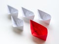 Leadership concept. Red paper ship lead among white. One leader Royalty Free Stock Photo