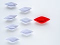 Leadership concept. Red paper ship lead among white. One leader Royalty Free Stock Photo