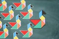 Leadership and creativity concept with tangram puzzle bird leading Royalty Free Stock Photo