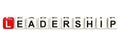 Leadership cube crossword on white background Royalty Free Stock Photo