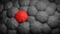 Leadership or distinction concept. Red umbrella and many black umbrellas around. 3D rendered illustration