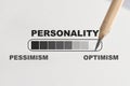 Optimism and pessimism personality loading on white paper with pencil Royalty Free Stock Photo