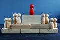 Leadership and management. Wooden figures and blocks Royalty Free Stock Photo