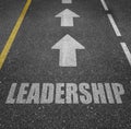 Leadership marked on a tarmac road Royalty Free Stock Photo