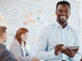 Leadership, motivation and business man planning on digital tablet and looking proud in a group meeting. Strategy Royalty Free Stock Photo