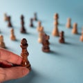 Leadership qualities in the working team, strong leader, concept. Chess pieces