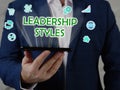 LEADERSHIP STYLES phrase on the screen. Loan officer use internet technologies at office. Concept search and LEADERSHIP STYLES Royalty Free Stock Photo