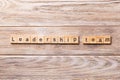 Leadership team word written on wood block. leadership team text on wooden table for your desing, concept Royalty Free Stock Photo