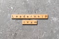 Leadership team word written on wood block. leadership team text on cement table for your desing, concept Royalty Free Stock Photo