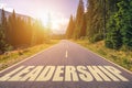 Leadership word written on road in the mountains Royalty Free Stock Photo