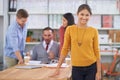 Leading her business team into future success. Portrait of an attractive young woman with her colleagues in the Royalty Free Stock Photo