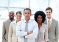 Leading them to success. Business manager stands confidently with his team behind him. Royalty Free Stock Photo