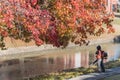 Leaf blower cleaning along riverside pathway in suburbs Dallas, Texas Royalty Free Stock Photo