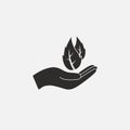 Leaf in hand icon. Vector illustration, flat design Royalty Free Stock Photo