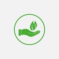 Leaf in hand icon. Vector illustration, flat design Royalty Free Stock Photo