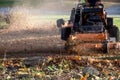 leaf mulching in a fall yard Royalty Free Stock Photo