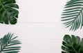 Leaf on wooden table, composition with top view, branch and leaves on wood desk with copy space.