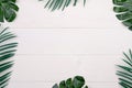 Leaf on wooden table, composition with top view, branch and leaves on wood desk with copy space.