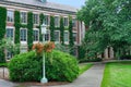 College campus with ivy covered building Royalty Free Stock Photo