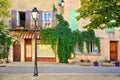 Leafy house fronts with shuttered windows, Provence, France