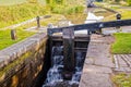 Leaking Lock Gate, Worcester and Birmingham Canal. Royalty Free Stock Photo